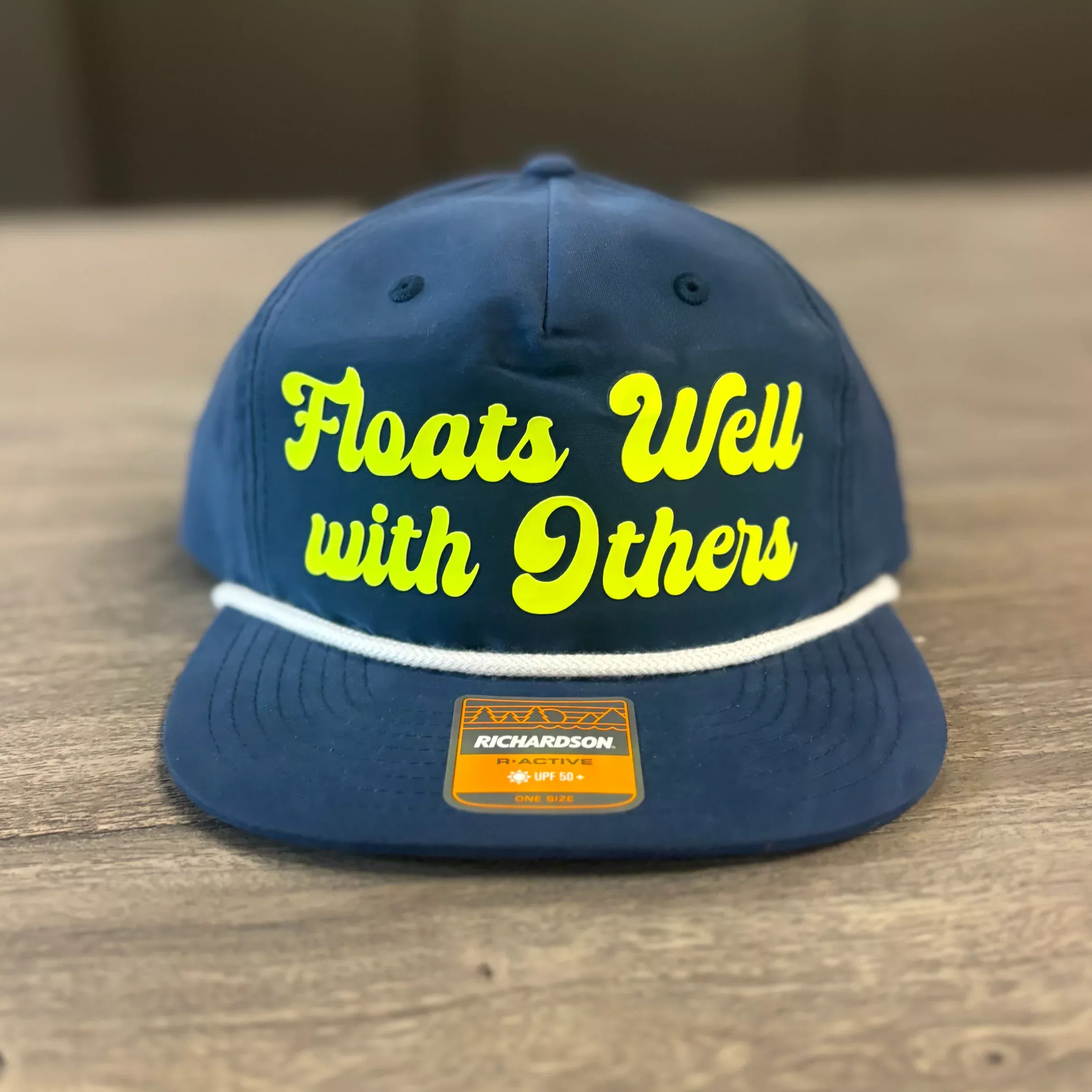 “Floats Well With Others” Richardson Hat – Navy & Neon Yellow Trucker Cap