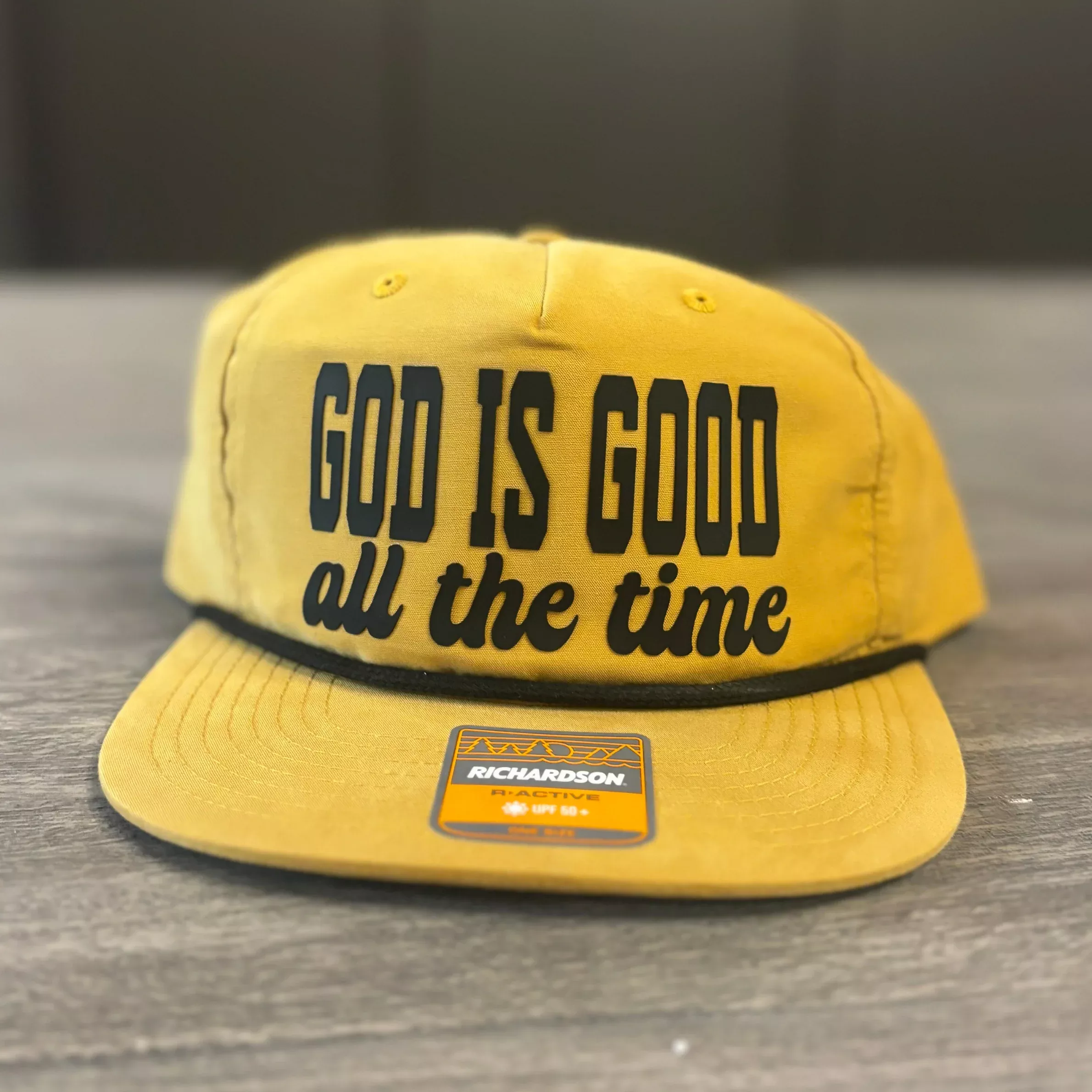 “God Is Good All The Time” Richardson Hat – Mustard Yellow & Black Trucker Cap