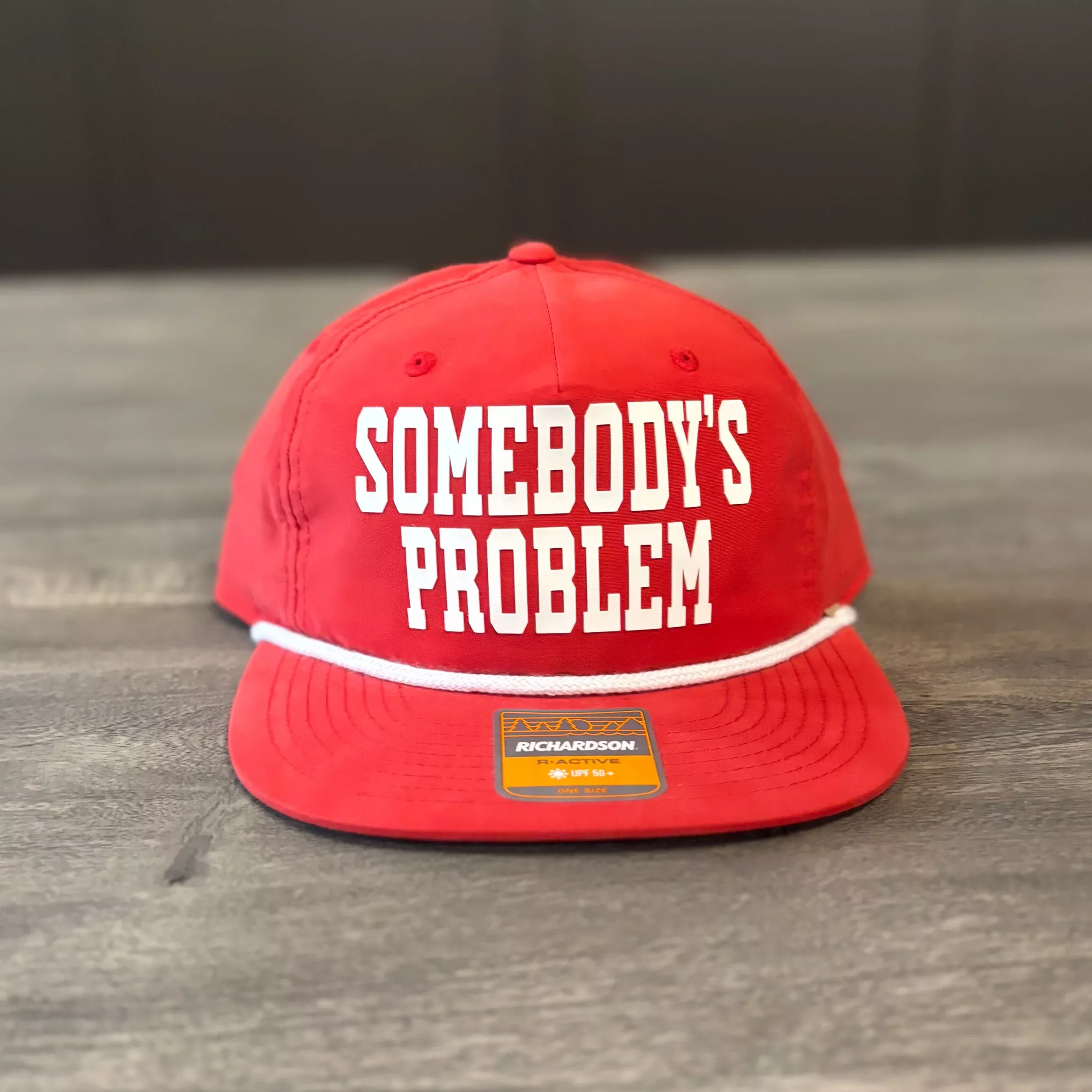 “Somebody’s Problem” Richardson Hat – Bold Red & White Trucker Cap
